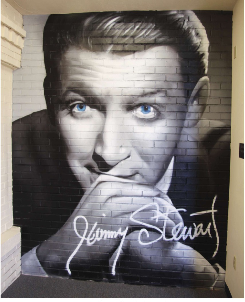 A Jimmy Stewart wall mural on display at the museum.